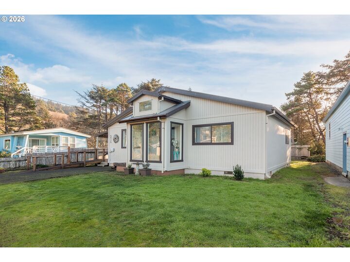 Property Photo:  5925 Coates Ave  OR 97112 