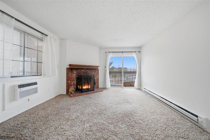 Property Photo:  14794 E 2nd Avenue 310F  CO 80011 