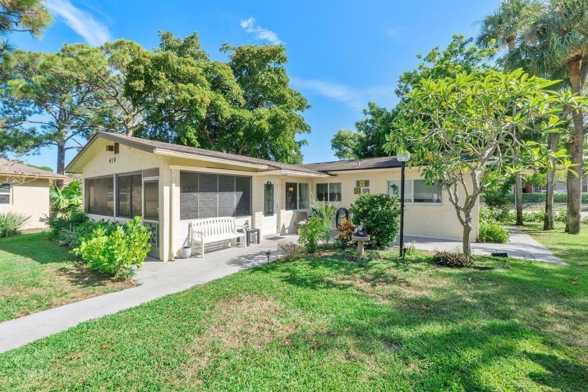 Property Photo:  410 SW Natura Avenue  FL 33441 