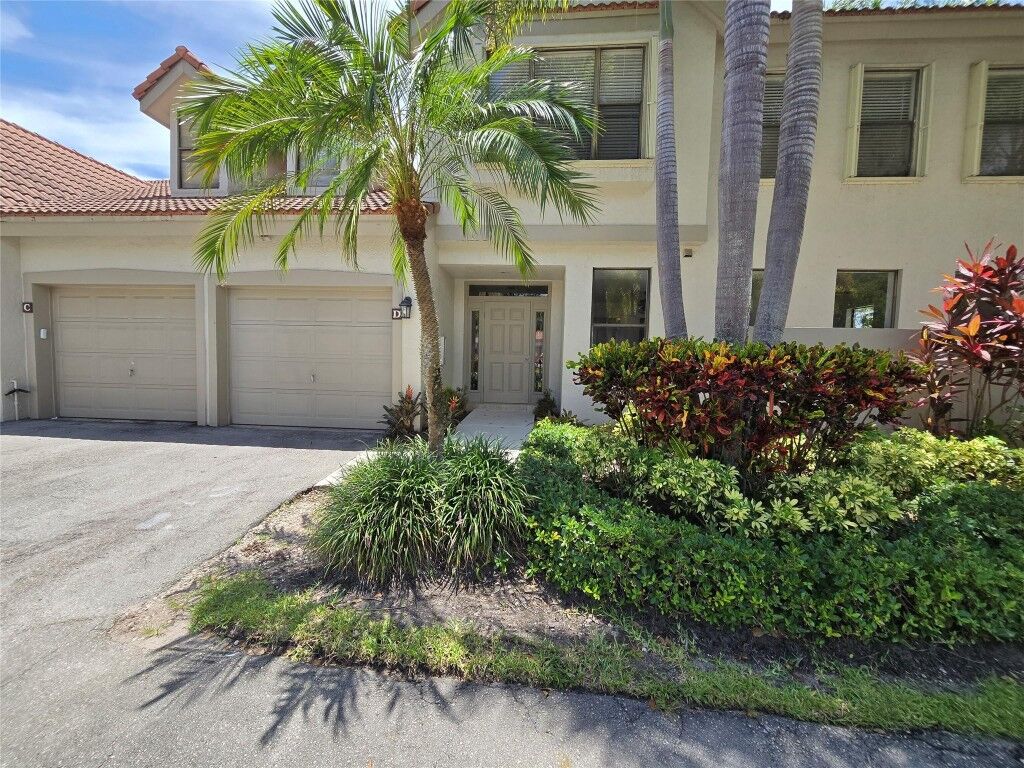 Property Photo:  5800 Coach House Circle D  FL 33486 