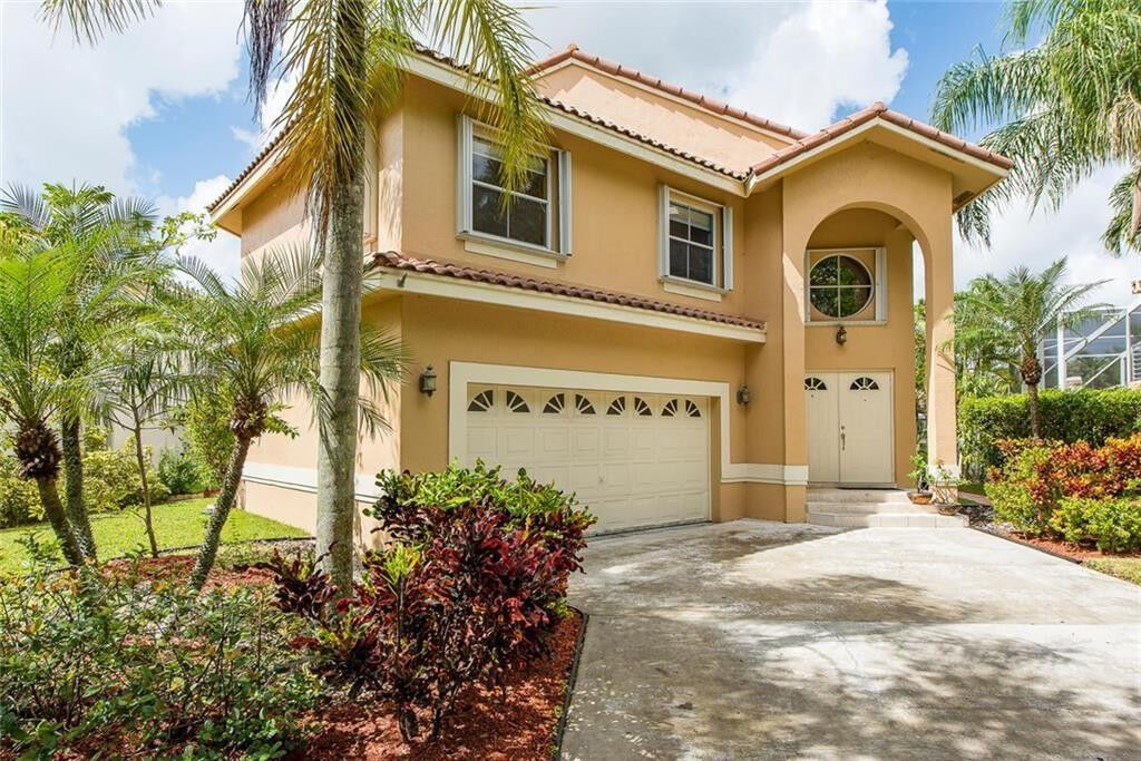 Property Photo:  5911 NW 59th Avenue  FL 33067 