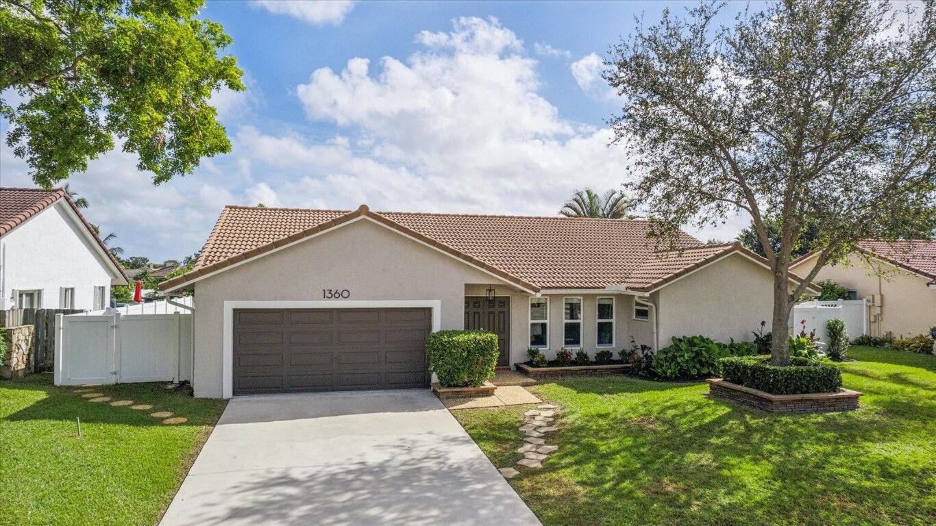 Property Photo:  1360 NW 99th Avenue  FL 33322 