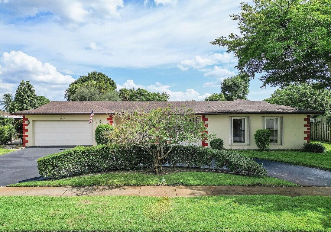 Property Photo:  6710 SW 6th Street  FL 33068 