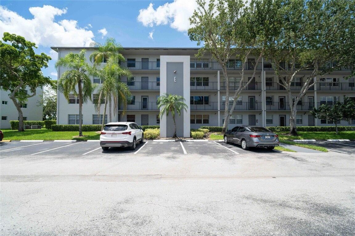 Property Photo:  300 SW 134th Way 402E  FL 33027 