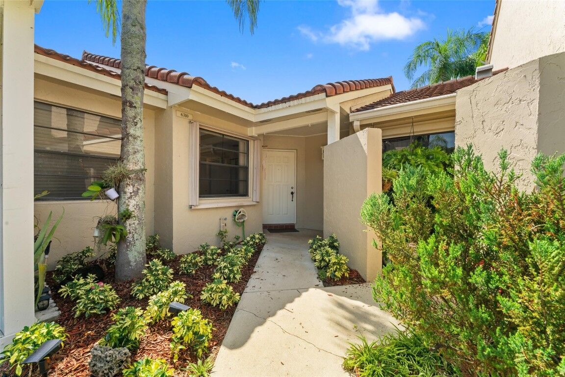 Property Photo:  6310 NW 170th Lane 6310  FL 33015 