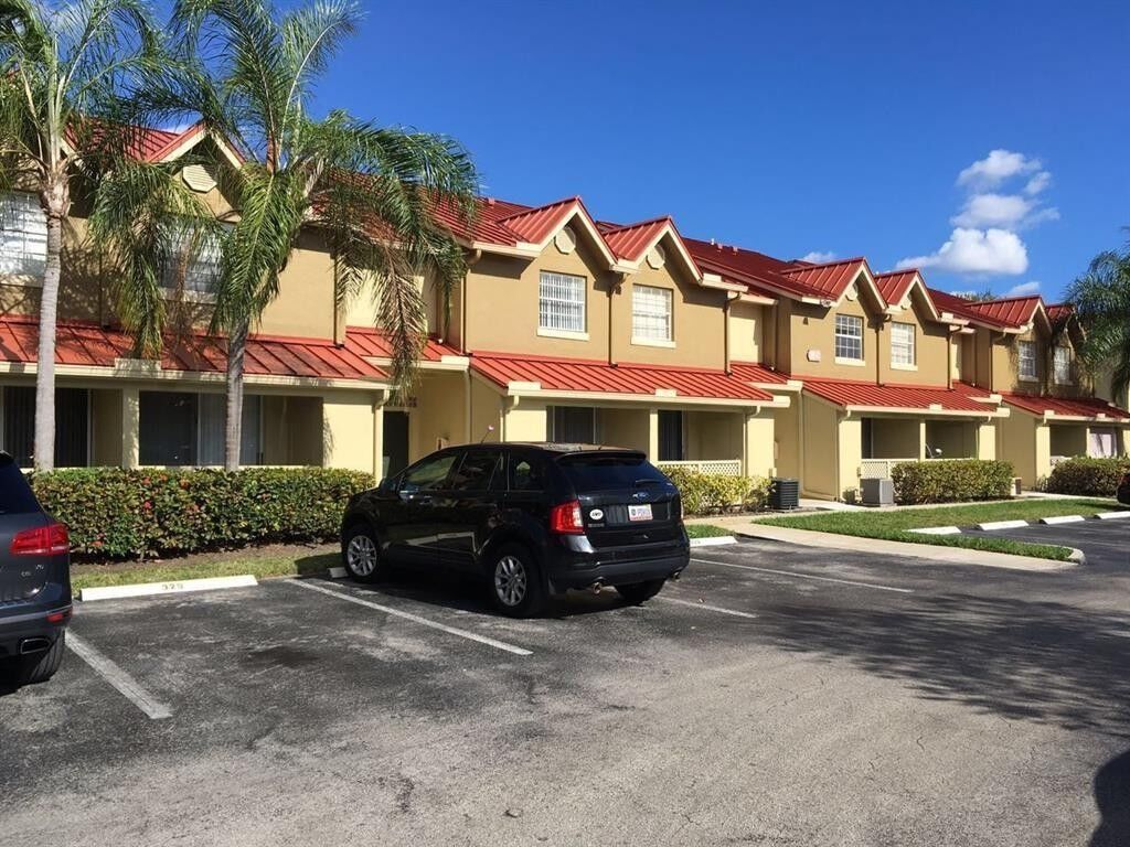 Property Photo: 18340 NW 68th Avenue F FL 33015