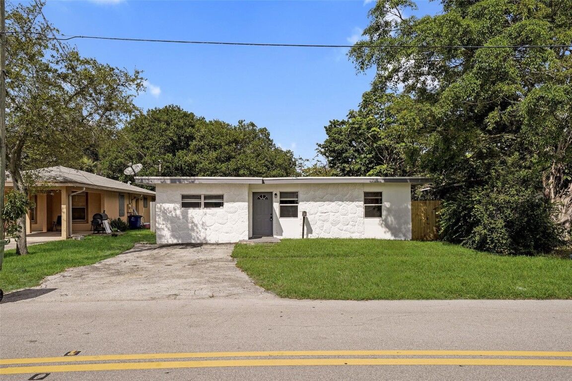 Property Photo:  1025 NW 8th Street  FL 33009 