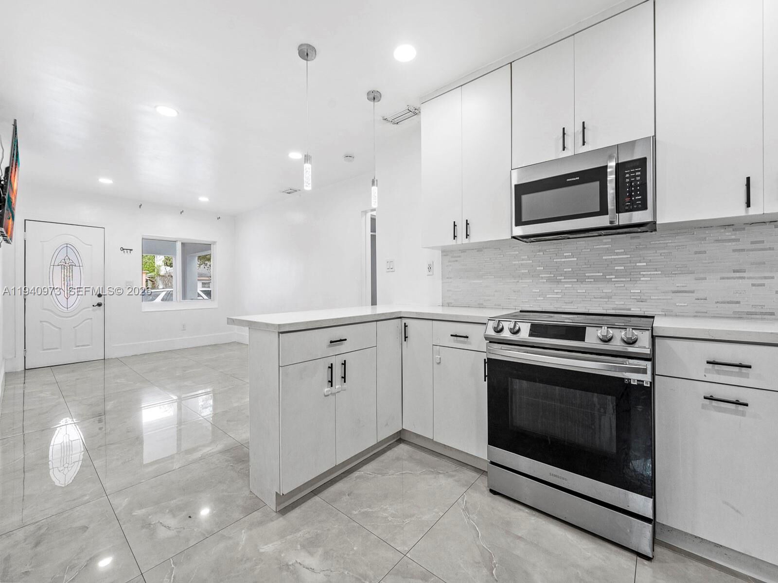 Property Photo:  1230 NW 35th St  FL 33142 