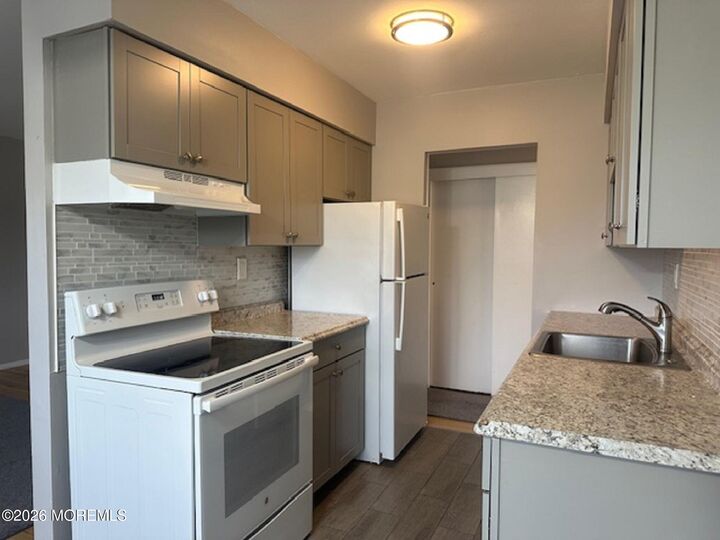 Property Photo:  61 Stonehurst Boulevard F  NJ 07728 