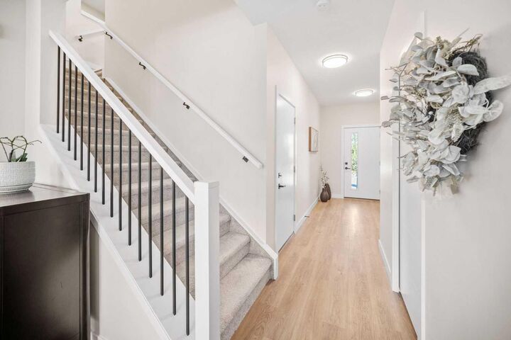 Property Photo:  201 Cooperswood Green SW 204  AB T3B 3Y6 