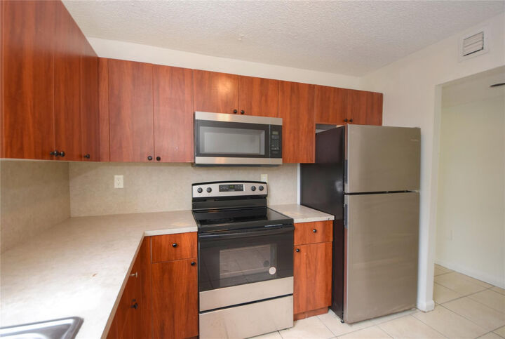 Property Photo:  1790 NW 55th Avenue 202  FL 33313 