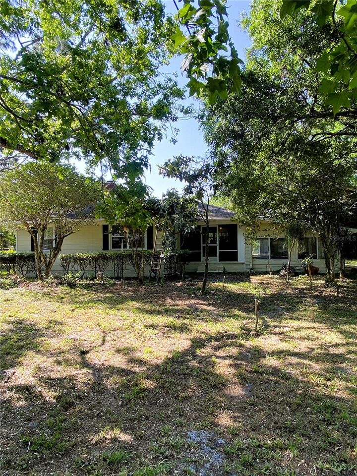 Property Photo:  5500 Lake Lizzie  FL 34771 