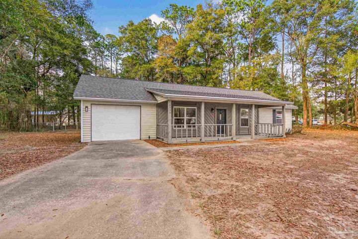 Property Photo: 6356 Banyan Dr FL 32570