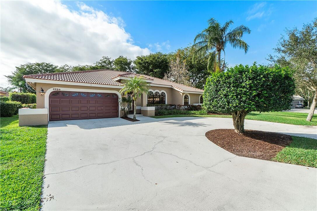 Property Photo:  3958 NW 57th Street  FL 33073 