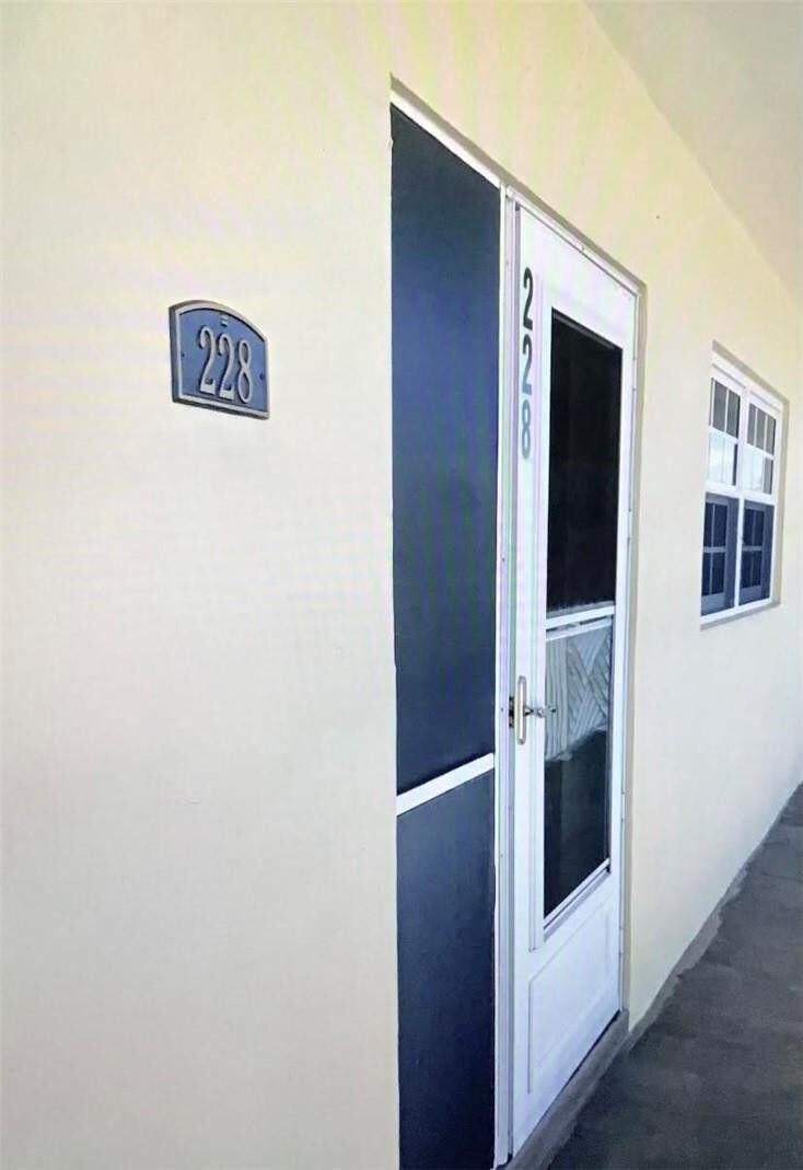 Property Photo:  1951 NE 39th Street 228  FL 33064 