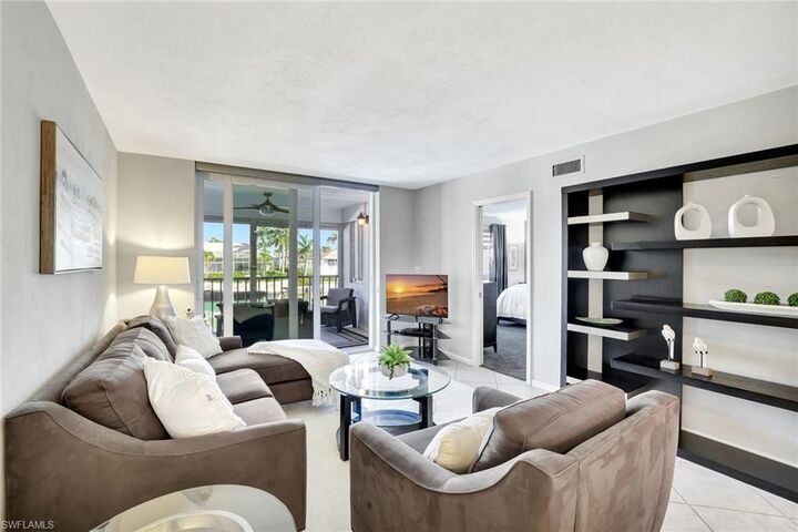 Property Photo: 889 Collier Ct 2-203 FL 34145