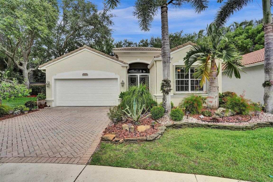 Property Photo: 12419 Landrum Way FL 33437