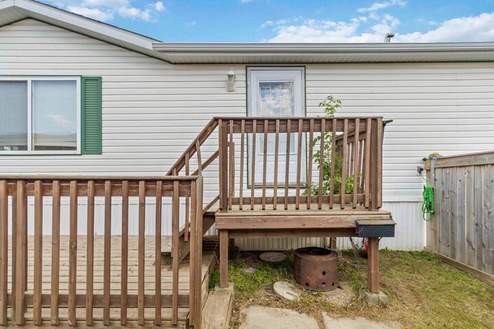 Property Photo:  128 Caouette Crescent  AB T9K 2H5 