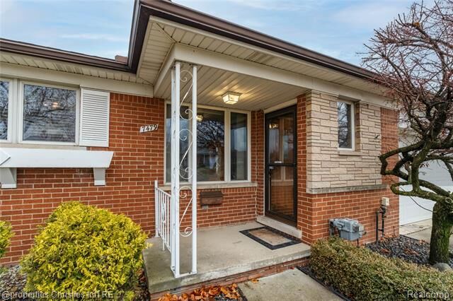 Property Photo:  7479 Carrousel Boulevard  MI 48185 