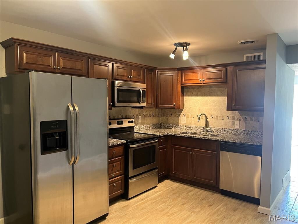 Property Photo:  6990 Colonial Woods Drive  MO 63129 