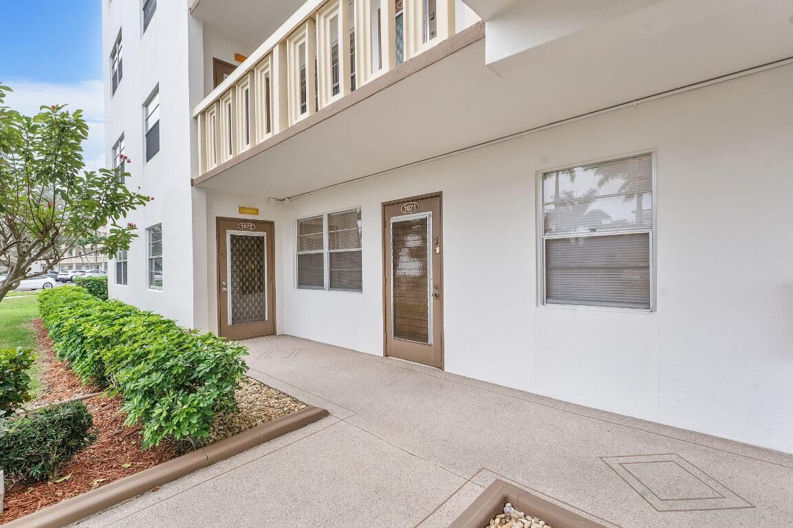 Property Photo:  1071 Guildford D  FL 33434 