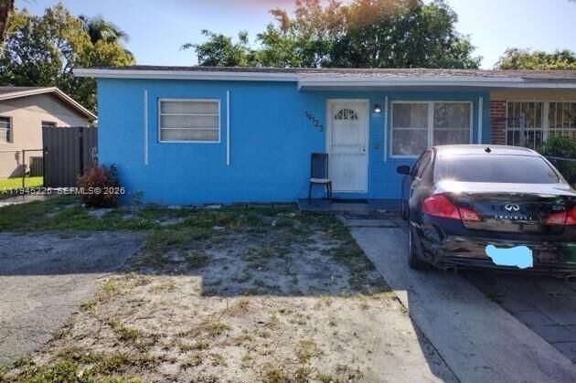 Property Photo:  19123 NW 35th Ave  FL 33056 