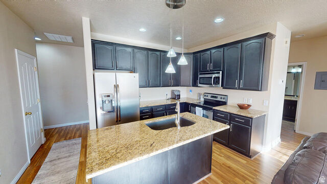 Property Photo:  6986 W Harlech Ln  UT 84128 