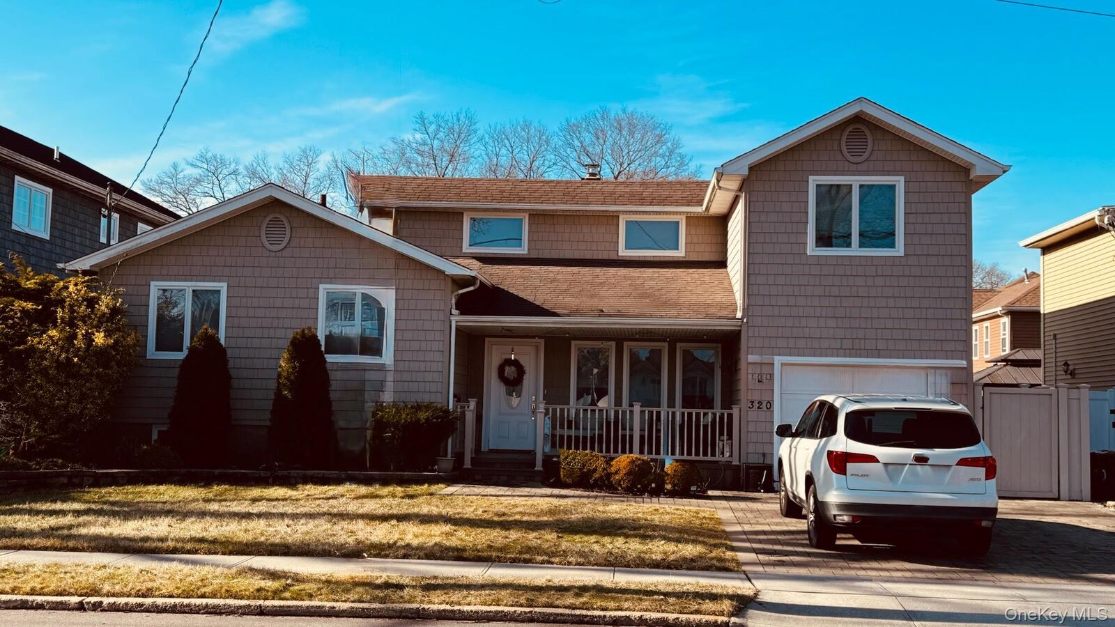 Property Photo:  320 Roosevelt Avenue  NY 11762 