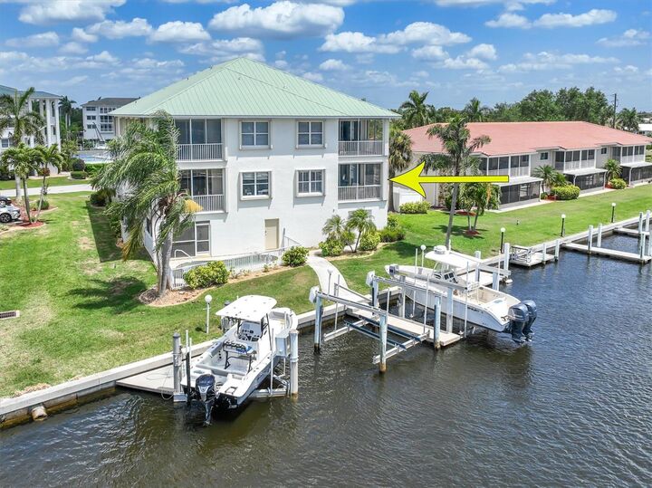 Property Photo:  129 Breakers Court 121  FL 33950 