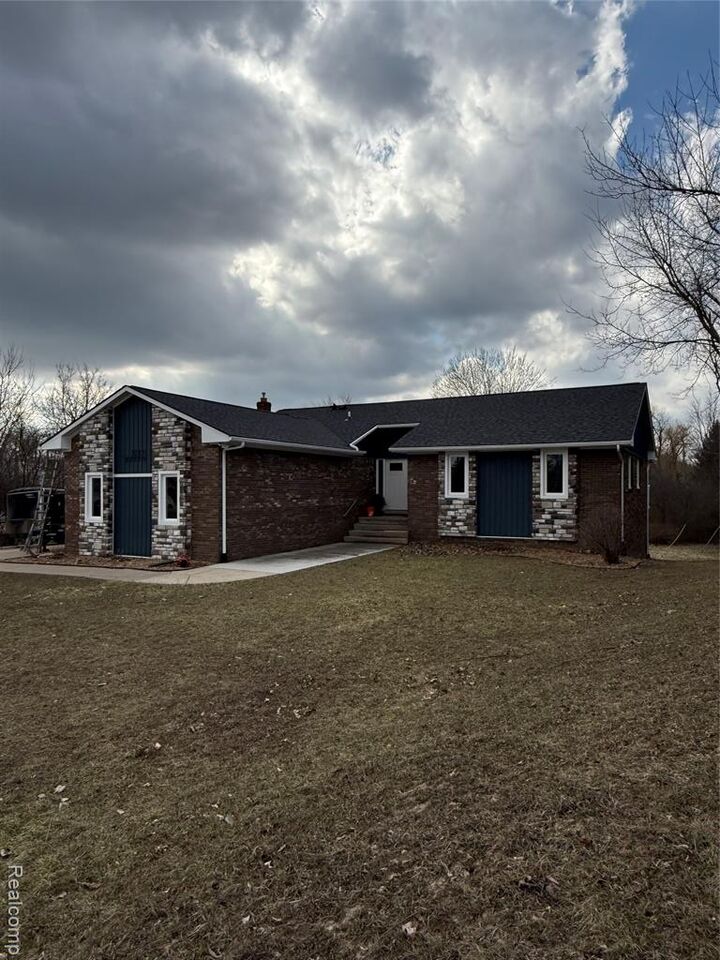 Property Photo: 20771 Halsted Road MI 48167 8914