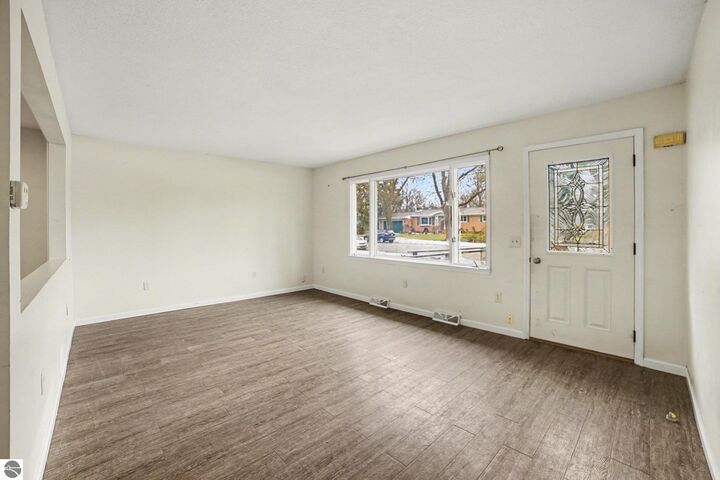 Property Photo:  303 Orchard Avenue  MI 48617 