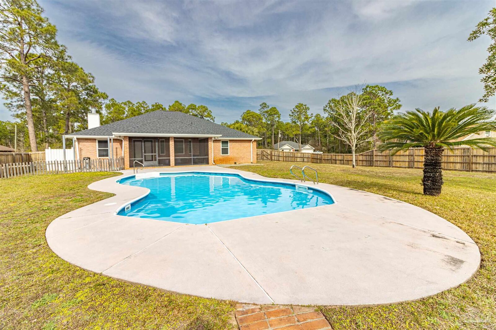 Property Photo:  6977 Leisure St  FL 32566 