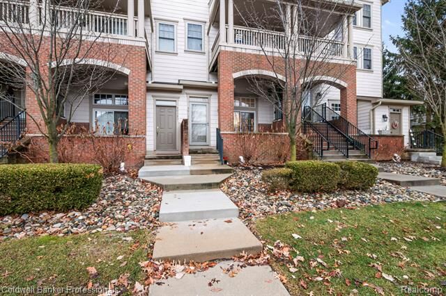 Property Photo:  50135 Harding Street 115  MI 48188 