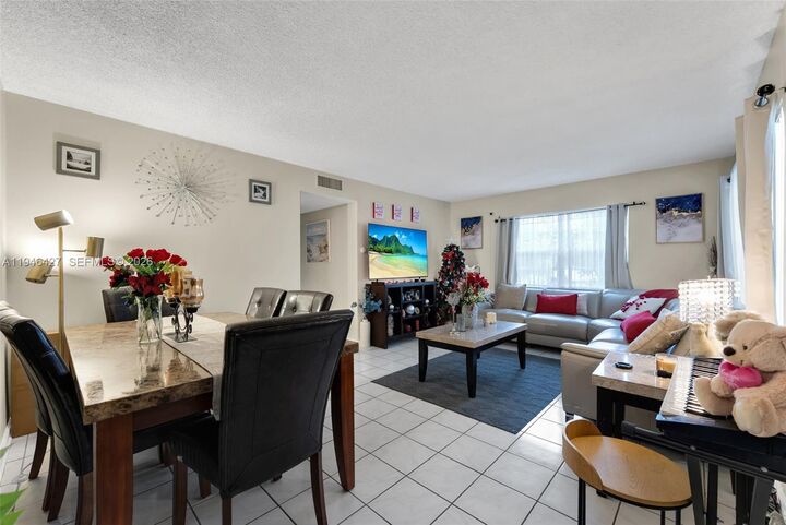 Property Photo:  9050 NW 28th St 131  FL 33065 