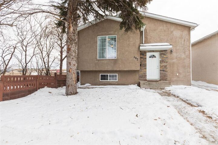 Property Photo:  403 Kensington Street  MB R3J 1J6 
