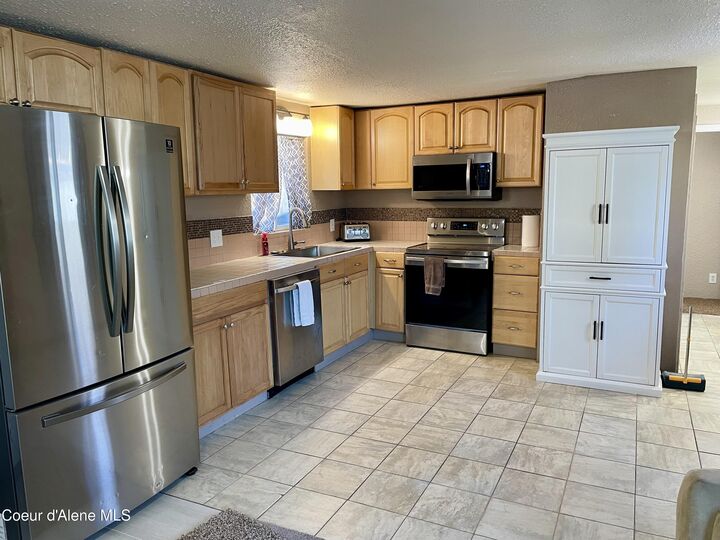 Property Photo:  8572 W Park Loop  ID 83858 