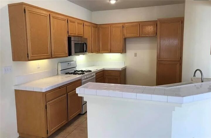 Property Photo:  7696 Calle Bastia  CA 92346 