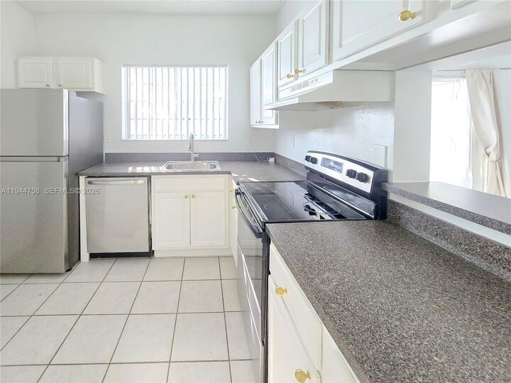 Property Photo:  2331 NW 96th Ter 17L  FL 33024 