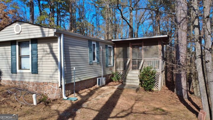 Property Photo:  7112 E Blacks Bluff Road  GA 30124 