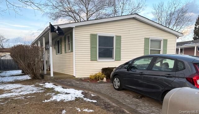 Property Photo: 42 Village Circle S NY 11949