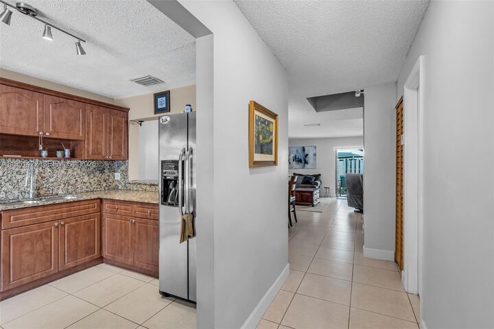 Property Photo:  1210 NW 99th Ave 66  FL 33024 