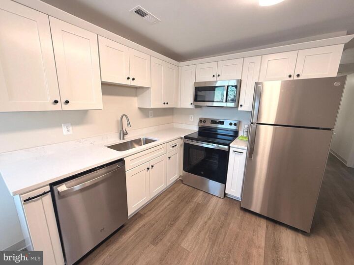 Property Photo:  21899 Three Notch Road Unit 6  MD 20653 