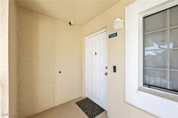 Property Photo:  7707 Jewel Lane 201  FL 34109 
