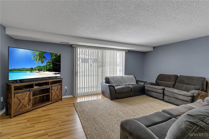 Property Photo:  90 Foxberry Drive A  NY 14068 