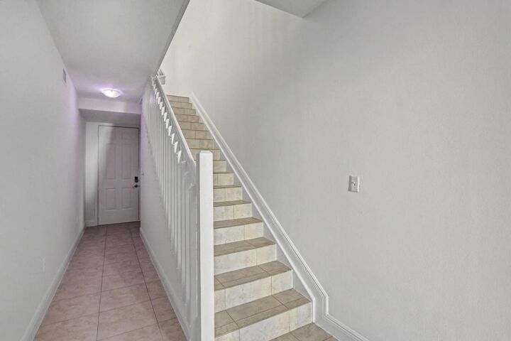 Property Photo:  350 NE 3rd Street 3-D  FL 33444 