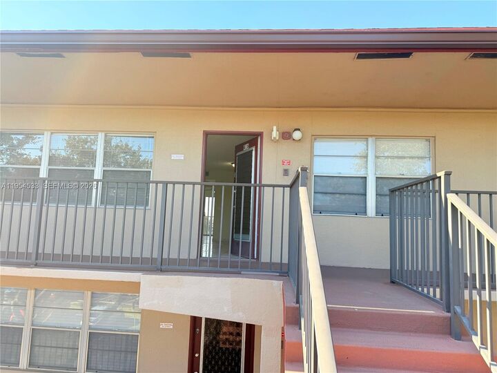 Property Photo:  850 SW 133rd Ter 416B  FL 33027 
