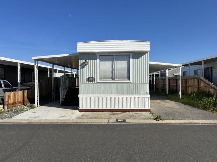 Property Photo: 720 E Worth Avenue 153 CA 93257