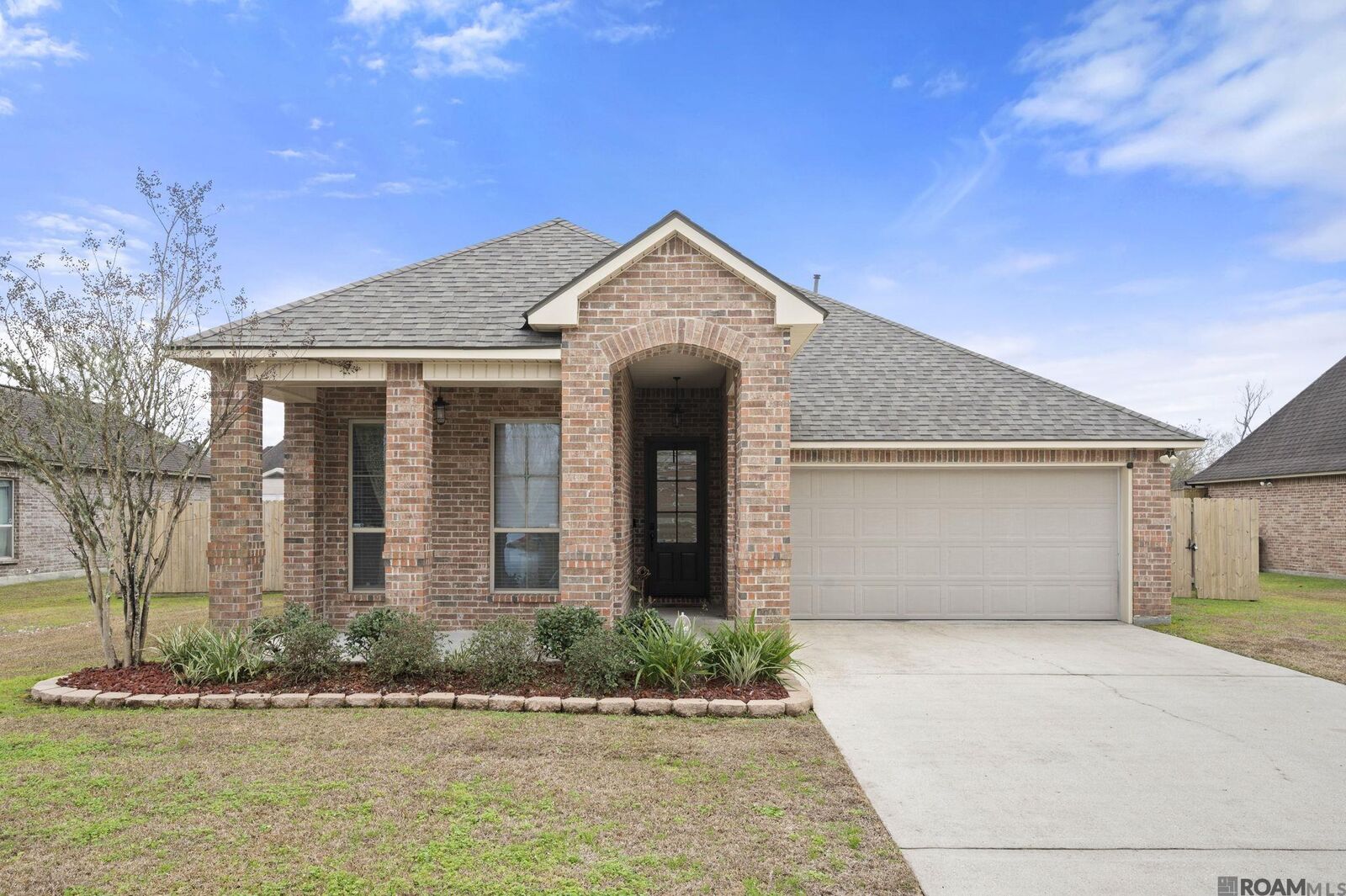 Property Photo:  20348 Grand Crus Ave  LA 70817 