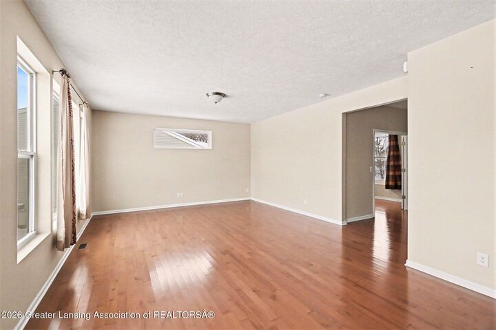 Property Photo:  6963 Abbey Lane  MI 48837 