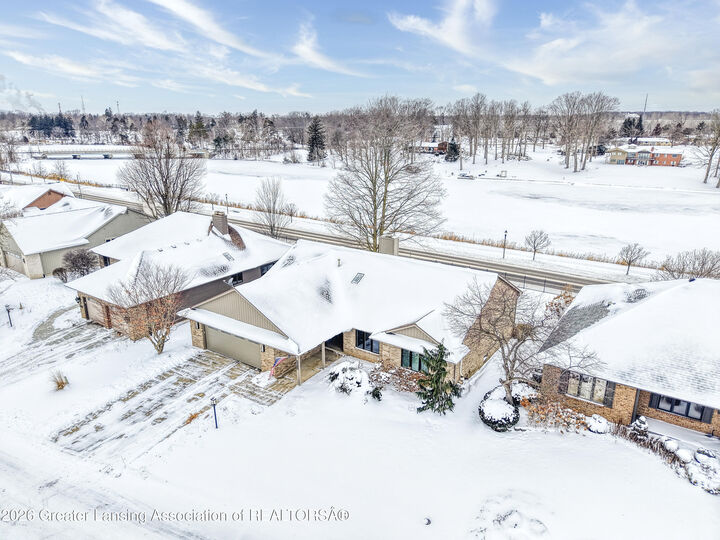 Property Photo:  3612 Muirfield Drive  MI 48911 